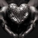 Aernie_black_and_white_mans_hand_holding_a_heart-shaped_symbol_3be4a897-90d8-417d-9f6a-0b51fd674db5